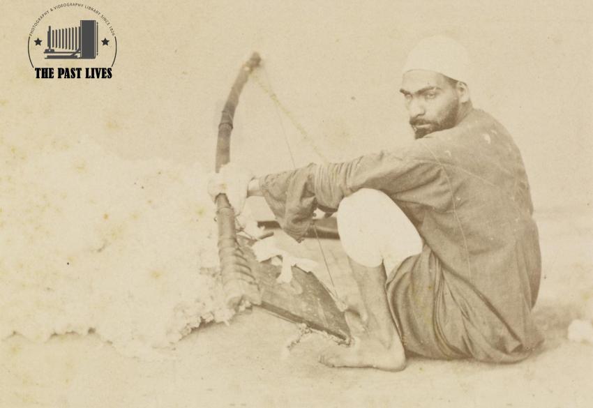 A cotton carder  in Egypt beating cotton  in 1860 Ad