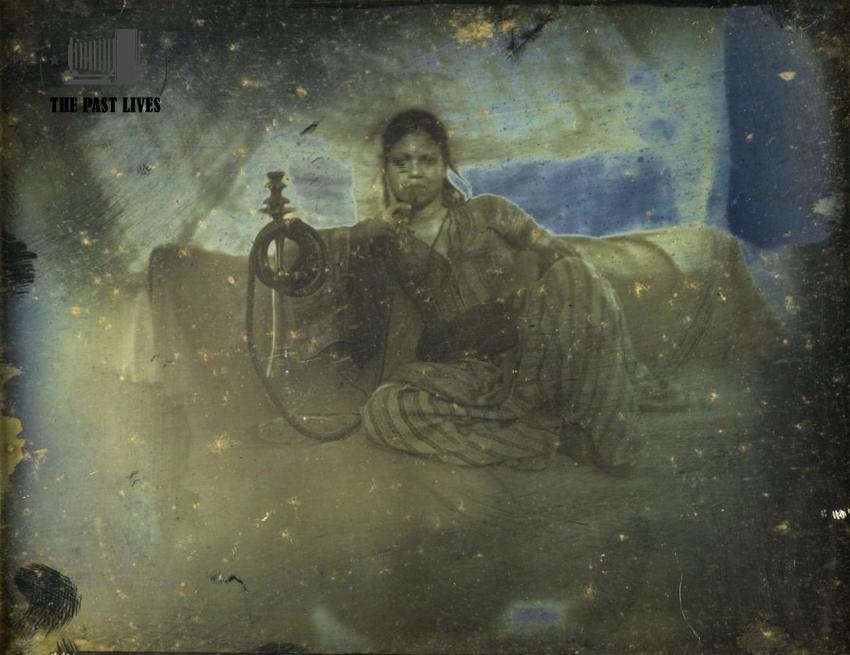 A woman smoking a hookah in 1843