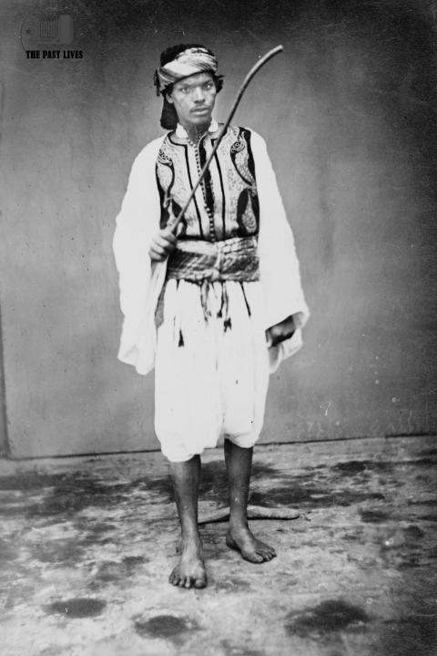 The Amshaji with his cane and distinctive clothing, 1860